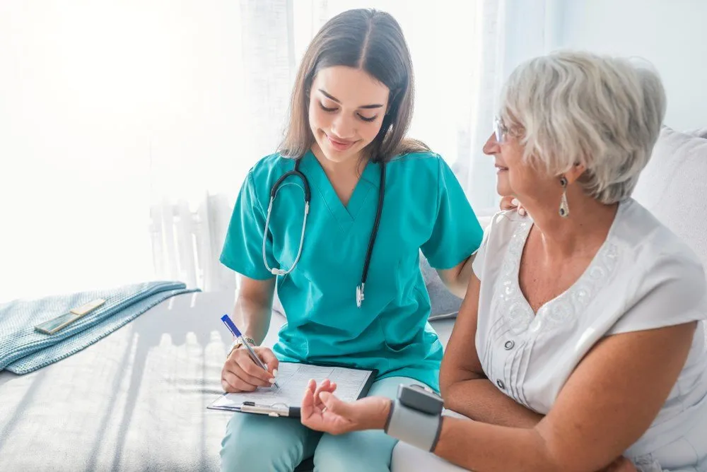 A GP talking with a patient at Wellow Fields